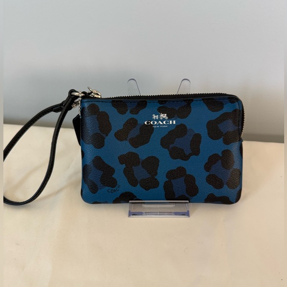 Coach Handbags - Coach Blue Ocelot Print Wristlet